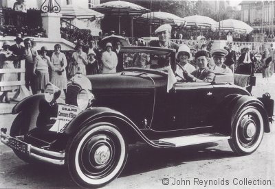 Bernard Citron (at the wheel) with his brother and sister and Maurice Chevalier